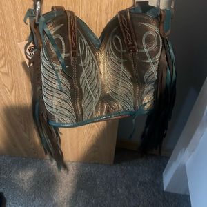 Western bag made out of old cowboy boots